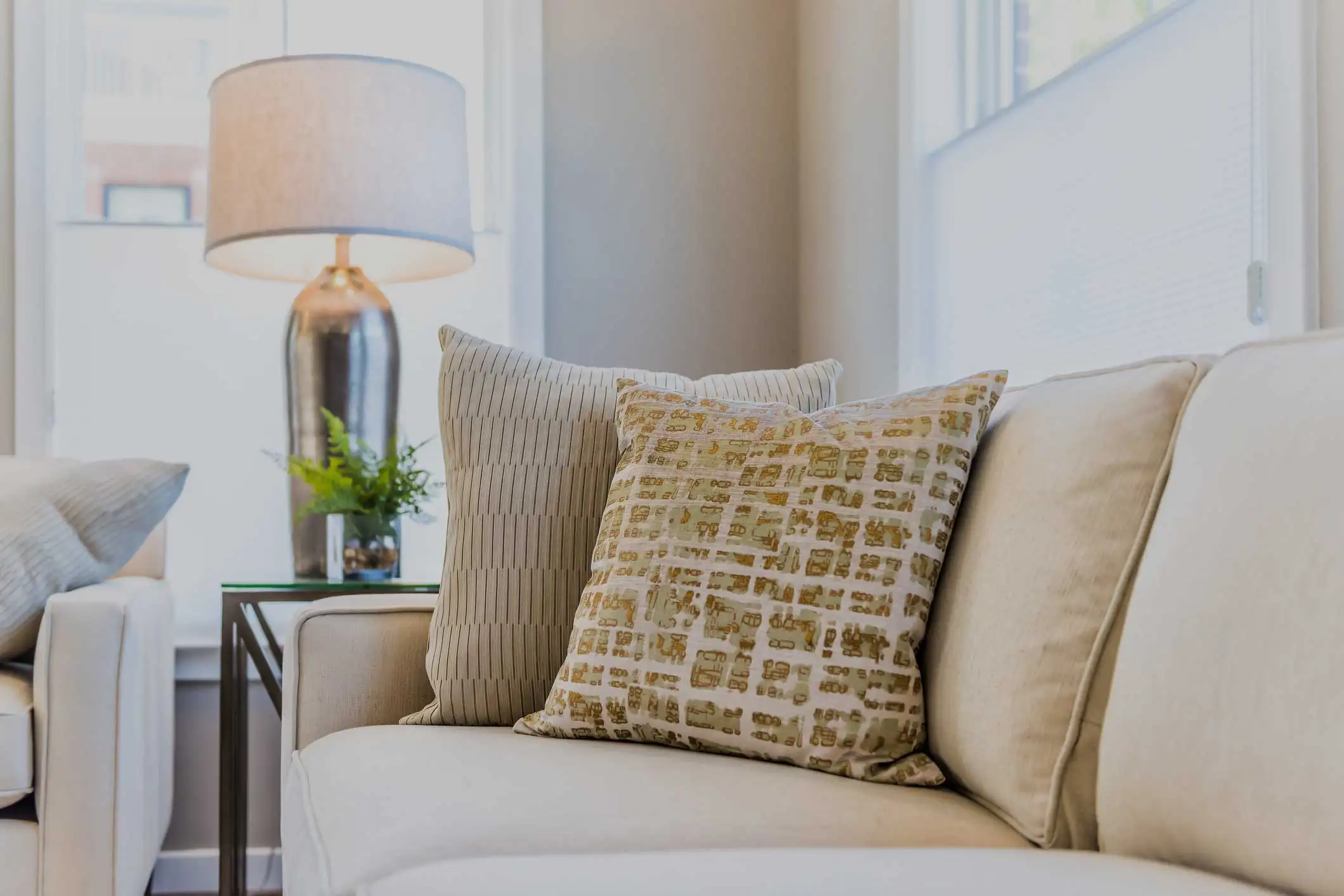 Magnolia Place couch with decorative pillows