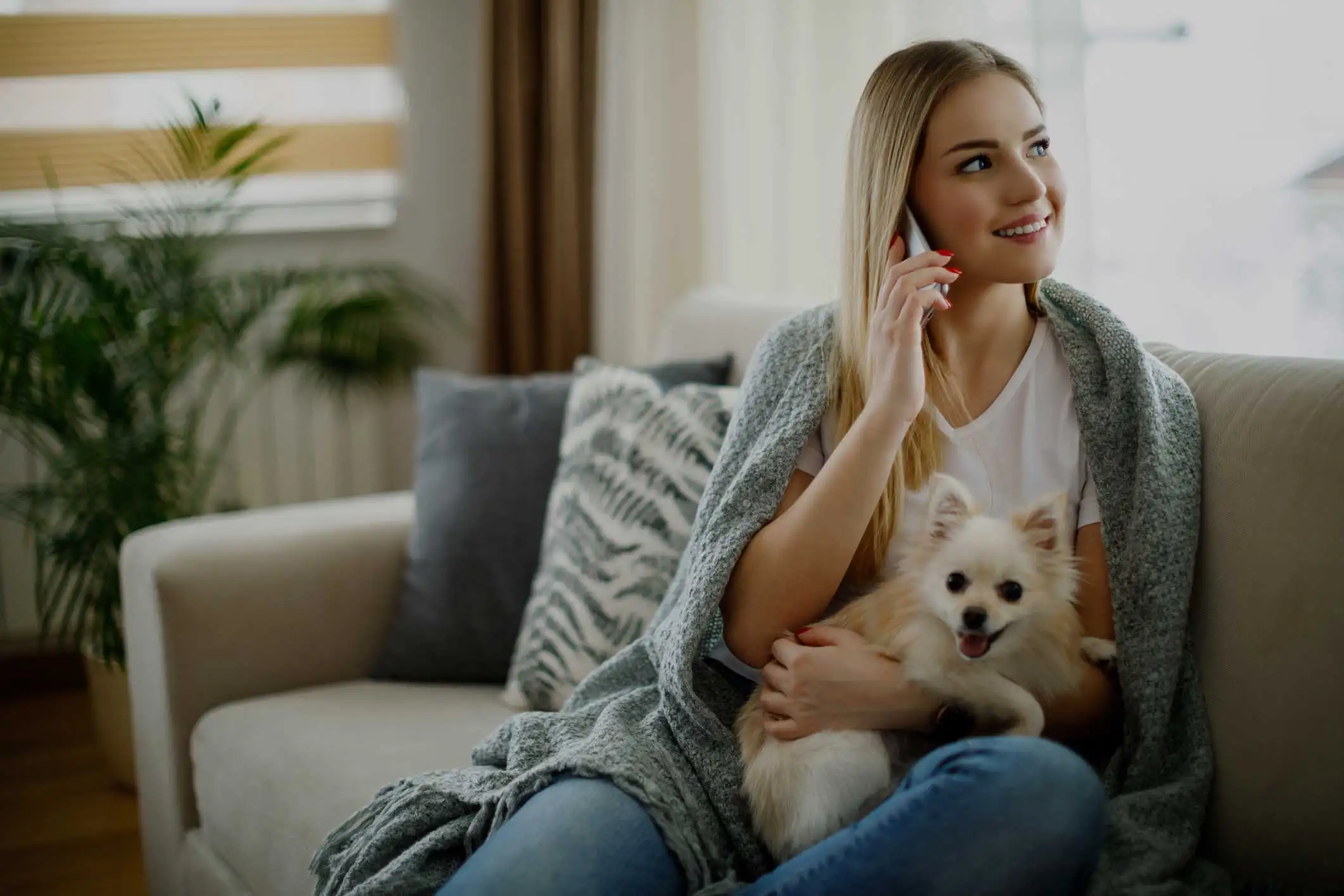 Magnolia Place woman with dog using phone